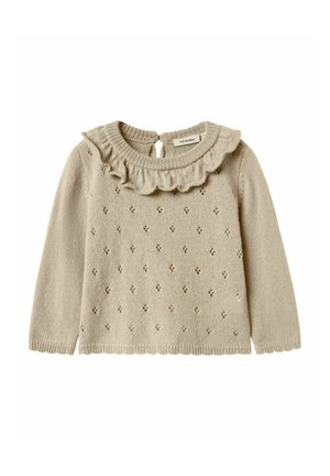 Beige gestrickter Pullover mit langen Ärmel, Rundhalsausschnitt, Rüschensaum und kleinen floralen Mustern. Verfügt über einen Schlüssellochverschluss hinten und einen gerippten Saum.