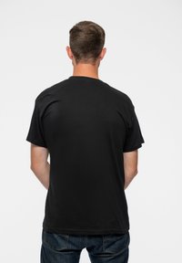 Paradiso Clothing THE BEATLES LIVE SHEA STADIUM UNISEX - Print T-shirt - black