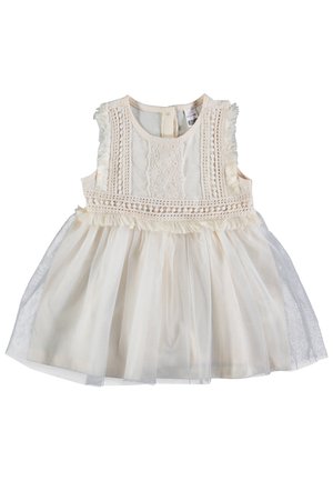 Vestido de bebé sin mangas color crema con detalles de encaje en el cuerpo, ribete de flecos y falda con sobreposición de tul.