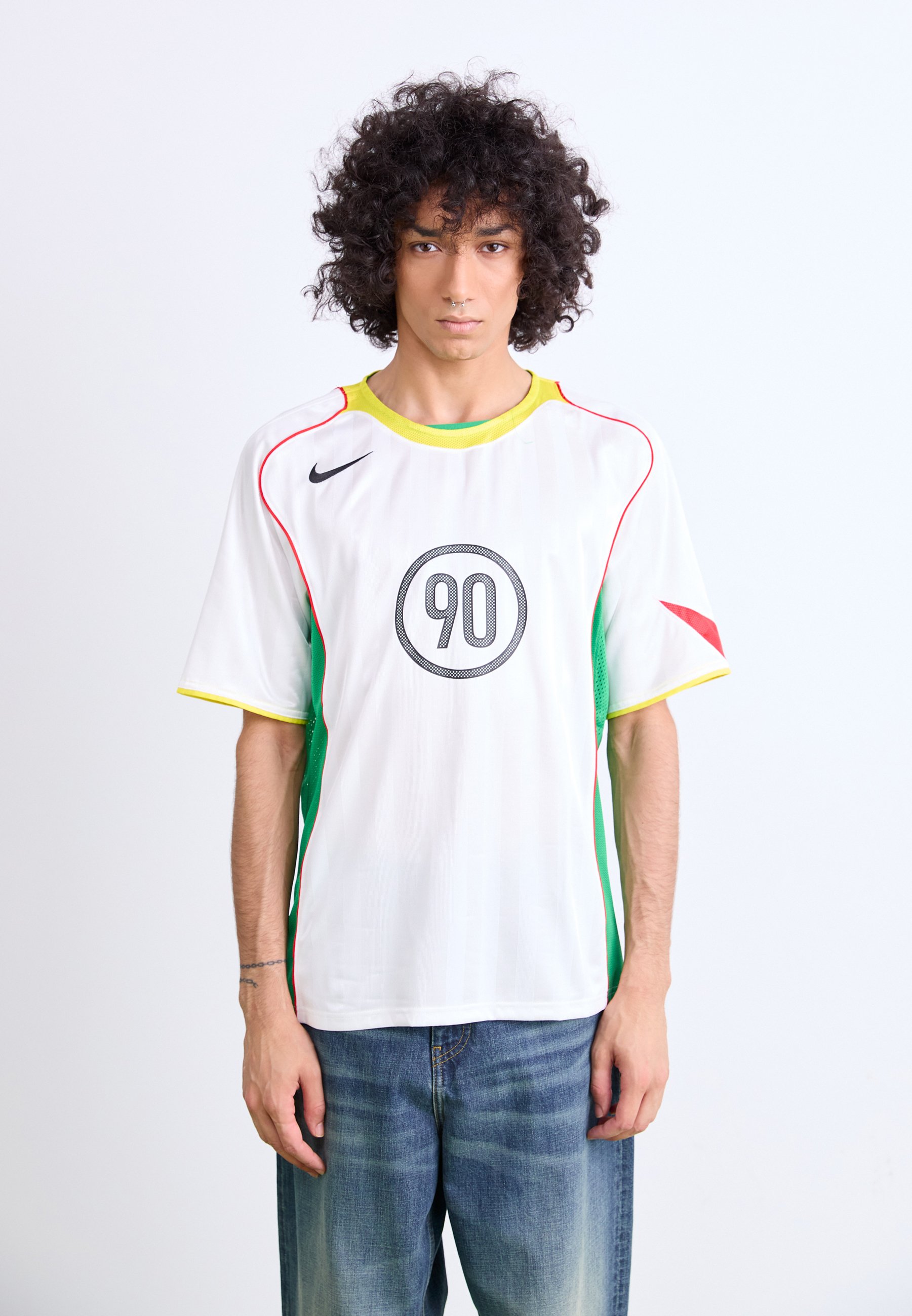 white yellow nike shirt