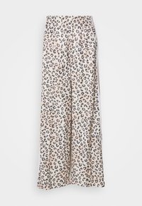 Lepardmönstrade vida byxor med elastisk midja, tillverkade av ett mjukt tyg. Har mörkbruna och svarta fläckar på en ljusbeige bakgrund.