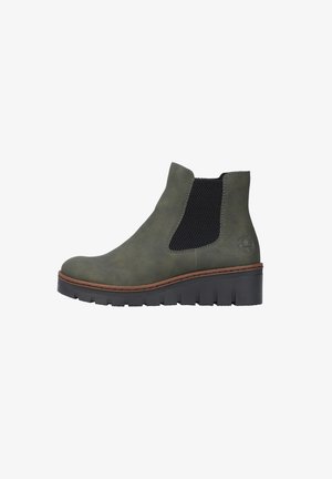 Olive green ankle boot with a smooth texture and elastic side panels, featuring a thick black rubber sole and brown stitching accents.