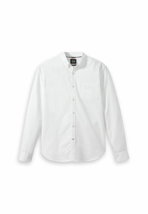 Camicia bianca a maniche lunghe con bottoni, realizzata in cotone, con colletto classico, taschino sul petto e tessuto leggermente testurizzato. Orlo arrotondato.
