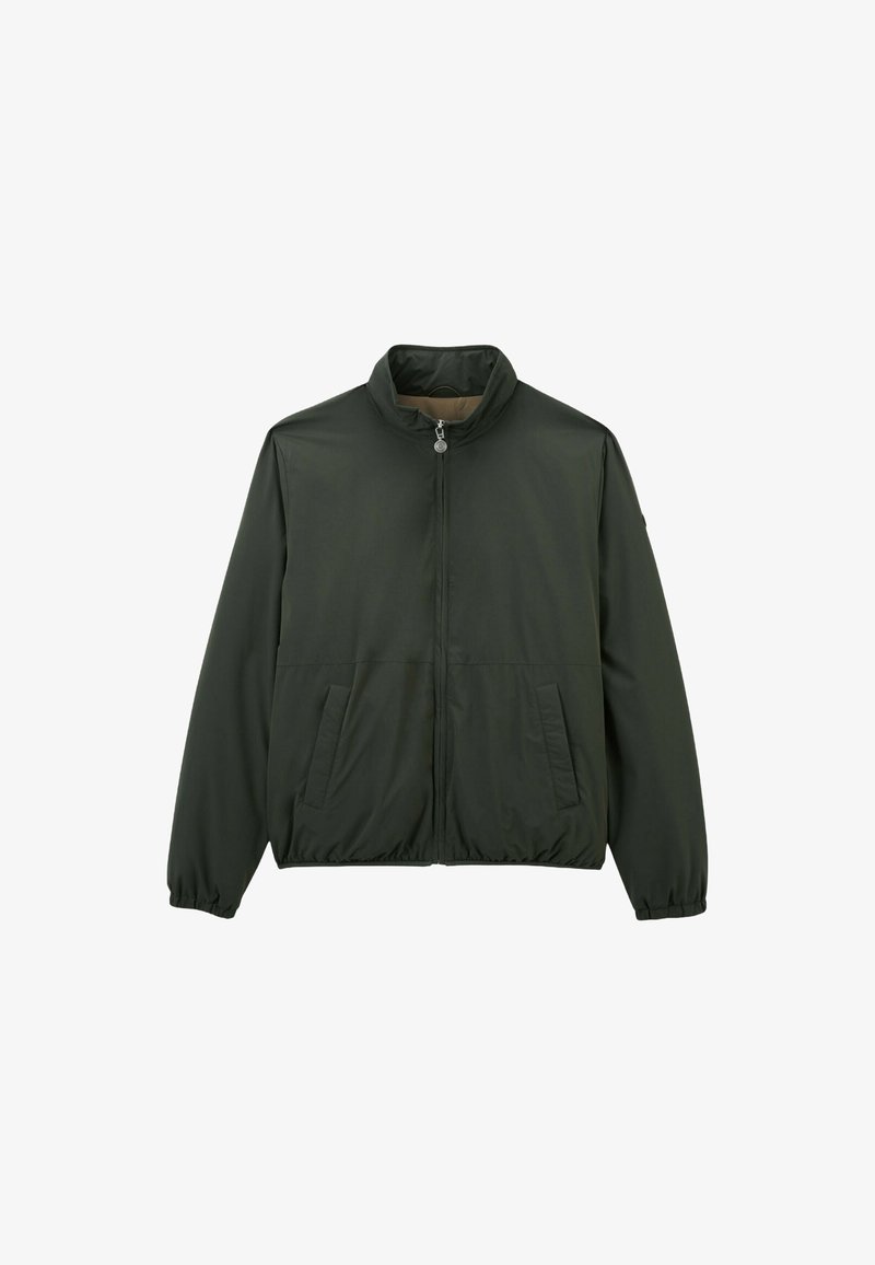 Veste légère vert foncé avec fermeture éclair sur le devant, col montant, poignets élastiques et deux poches latérales ; texture lisse.
