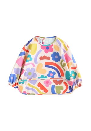 Colorful children’s smock featuring a playful pattern of flowers, hearts, and shapes, made from smooth, wipeable fabric with elasticized cuffs.