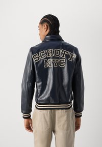 Schott STRIPE - Bomber stiliaus striukė - navy/off white