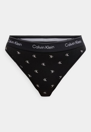 Zwarte katoenen slip met een witte Calvin Klein-logo tailleband en bedrukt zilveren initialen. Klassieke pasvorm met een gladde textuur en een gevormde snit.
