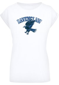 Balta medvilninė marškinėlių su trumpomis rankovėmis, papuošti mėlyna ir sidabrine blizgančia varna bei supaprastinta „Ravenclaw“ tekstu krūtinėje.