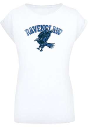 Valge puuvillane T-särk, millel on sinine ja hõbedane sädelev Raven ning "Ravenclaw" tekst stiilsel fonti rinnal. Lühikesed varrukad.