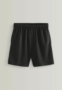 Pantaloni sportivi neri realizzati in tessuto a rete, dotati di una comoda vita elastica e tasche laterali, con una vestibilità ampia e lunghezza fino a metà coscia.