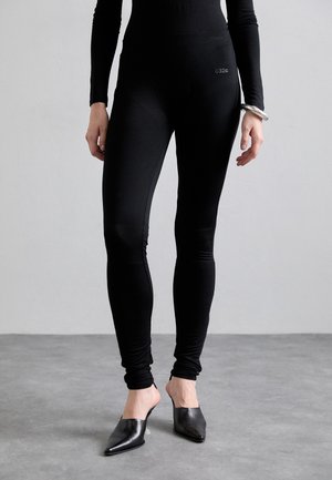 PILATES MOM LAYERED - Leggings - Trousers - black