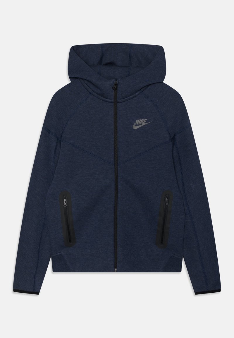 Námořnická modrá mikina na zip s kapucí, vyrobená z hladkého materiálu, s černým zipem a dvěma postranními kapsami na zip. Logo Nike na hrudi.