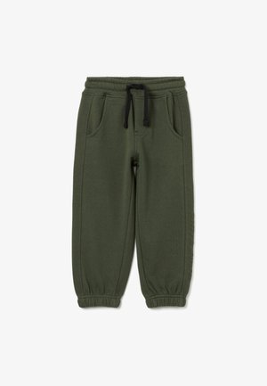 Dark green sweatpants made of soft fabric, featuring an elastic waistband with a drawstring, two side pockets, and elasticized cuffs.