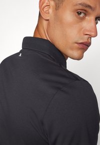 J.LINDEBERG Sports WINCE - Pólóing - black