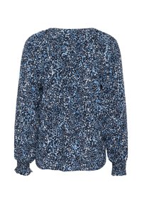 Blouse florale en bleu marine avec des motifs bleu clair et blancs. Dotée de manches longues avec des poignets élastiques et d'une coupe décontractée. Tissu doux et texturé.