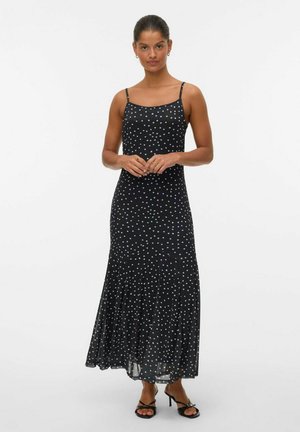 Robe maxi noire à fines bretelles, ornée d'un motif à pois de différentes couleurs, en matière fluide et avec un ourlet évasé.