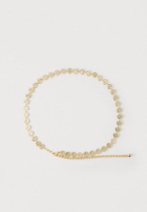 Gouden kettingriem met ronde schakels en fijne textuur, afgewerkt met een kettingverlenging en een kleine ronde sluiting.