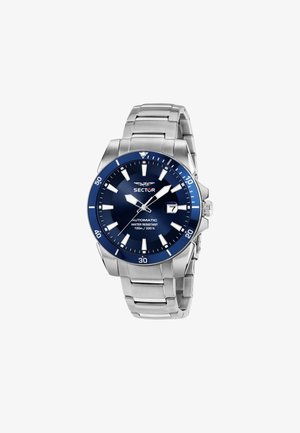 Montre automatique en acier avec un cadran et une lunette bleus. Comprend un affichage de la date, des index des heures luminescents et un bracelet en acier inoxydable. Résistante à l'eau jusqu'à 100 m.