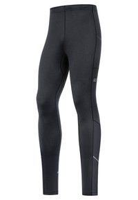 Leggings de sport noirs avec une texture lisse, une coupe ajustée, des accents réfléchissants, et un détail de poche sur le côté. Le matériau semble extensible et durable.