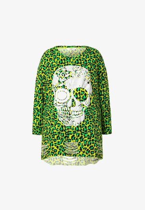 Grøn leopardprint langærmet top med et stort hvidt kranietryk med intrikate detaljer og udskæringsdetaljer ved kanten.