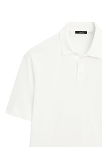 Polo shirt bianco con colletto classico, placket a tre bottoni e maniche corte; realizzato in morbido e traspirante tessuto di cotone.
