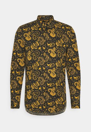Sort langærmet skjorte med knapper med gul og gylden paisley- og blomsterprint.