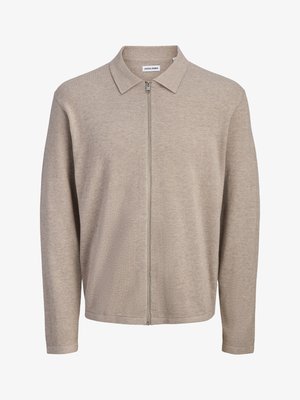 Beež pika varrukaga lukuga kampsun kraega, valmistatud pehmest kudumkangast, kaeluse siseküljel väike brändi silt.