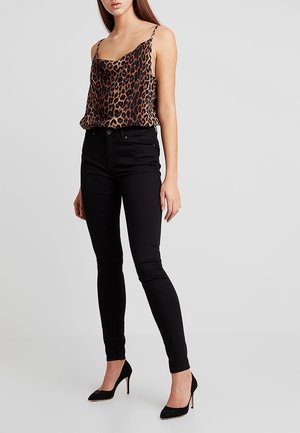 Vaqueros pitillo - black