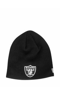 Black knit beanie featuring a white embroidered Raiders logo with a shield design. Soft texture, elongated shape, and no visible hardware.