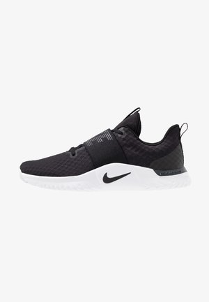 Baskets de sport noires avec semelle blanche, bande élastique au milieu du pied et logo Nike Swoosh sur le côté, vues de profil extérieur.