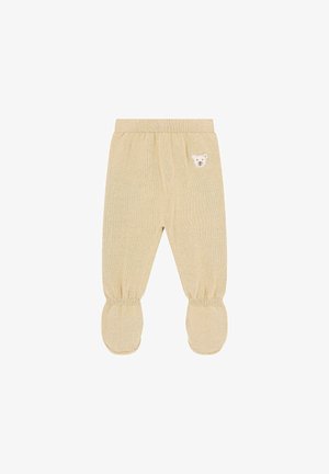 Pantalones de bebé de algodón beige con un aplique de cara de oso, cinturilla elástica y parte inferior con pies. Patrón de punto texturizado en toda la prenda.