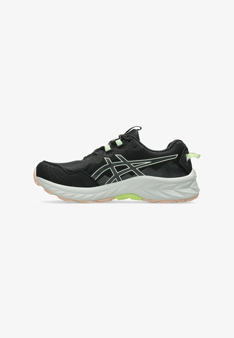 Black and white running shoe with light green accents, textured sole, and branded side stripes, designed for outdoor sports and comfort.