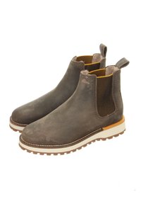 Braune Leder Chelsea-Stiefel mit elastischen Seiten, Zuglaschen, weißen Gummisohlen, strukturiertem Obermaterial und kontrastierender gelber Fütterung.