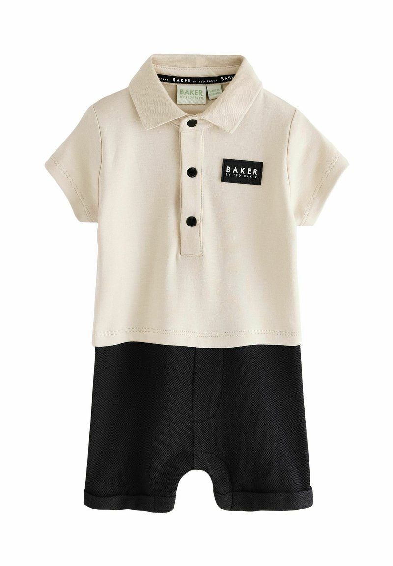 Mono polo de manga corta en crema y negro. Material de algodón con tapeta de botones, parche de logo negro y pantalones cortos texturizados en negro.