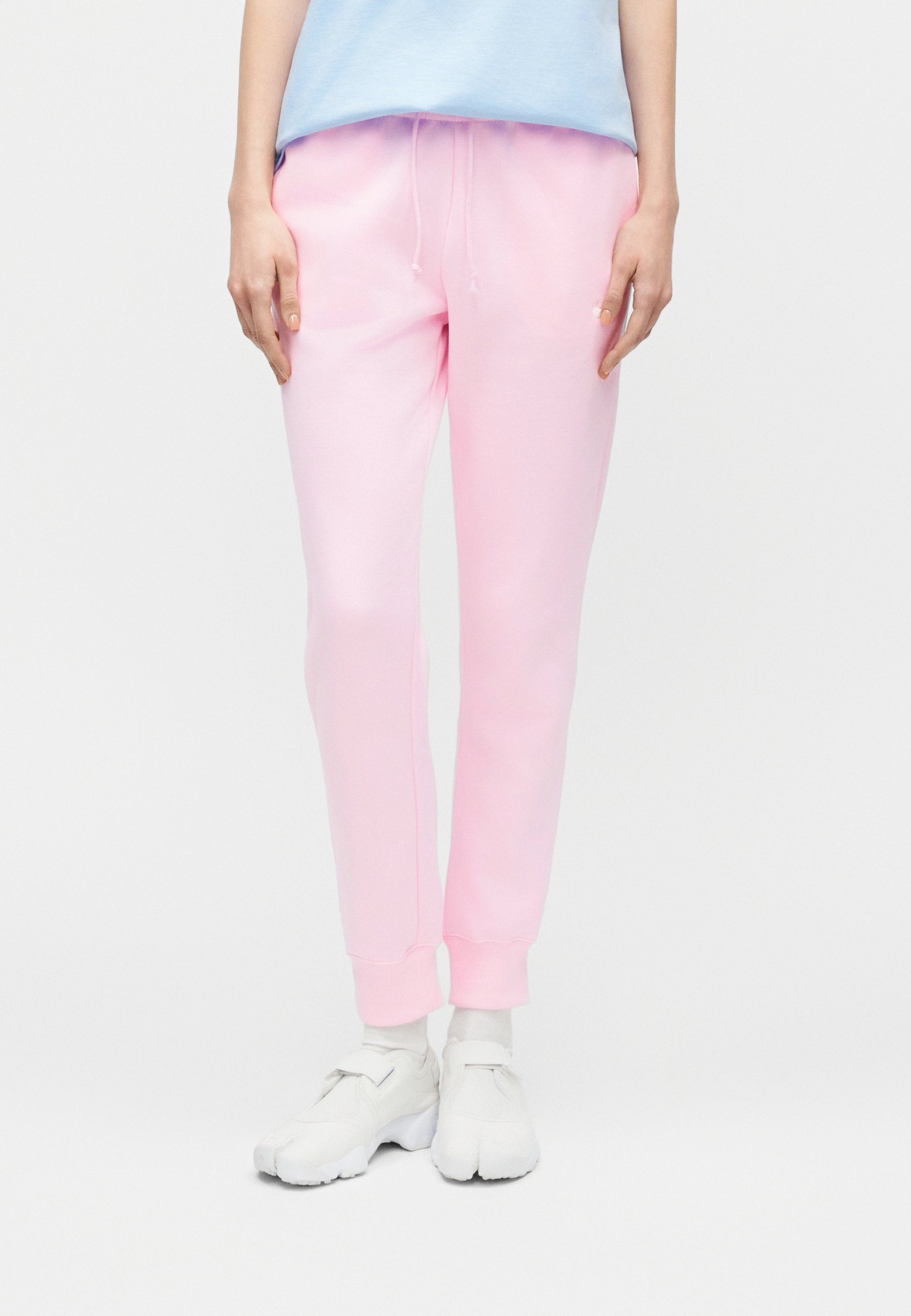nike bottoms in light pink with drawstring waist jogger
