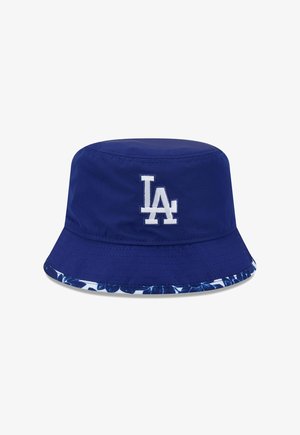 Navy blue bucket hat with white "LA" logo on front and a floral patterned brim edge in blue and white.