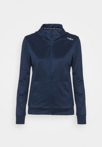 Marinblå vadderad zip-jacka med hög krage, diamantmönstrad textur, sidofickor och logotyp på bröstet. Tillverkad av slät och hållbar tyg.