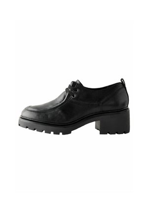 Schwarze Lederschuhe mit runder Zehenpartie, strukturiertem Obermaterial, doppelter Schnürung und dicker, klobiger Sohle. Mit einem moderaten Blockabsatz.