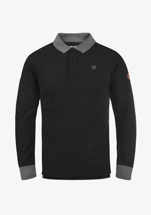 Svart långärmad polo med grå krage och manschetter, tvåknapplista och en cirkulär logotyp på bröstet. Mjukt, texturerat tyg.