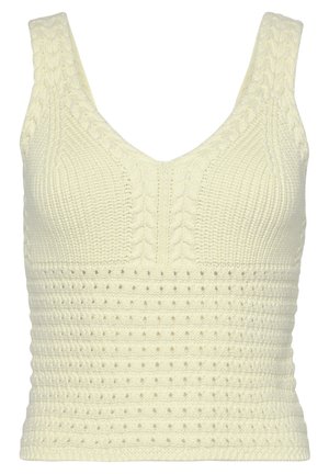Knitted sleeveless top in soft cream, featuring a V-neck, textured cable and dotted patterns, with a close-fitting silhouette.