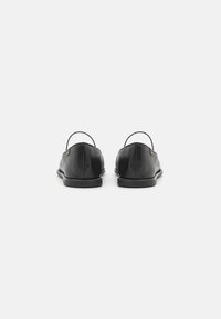 COACH EMILIA MARY JANE - Ankle strap ballet pumps - black