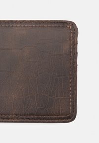 Brown leather wallet featuring a textured, embossed pattern, with visible stitching and a rectangular shape.
