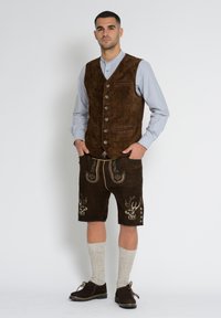 JCC Väst - brown