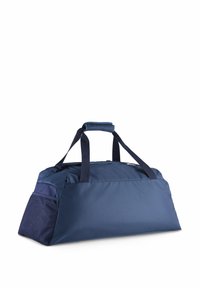 SAC À DOS MARINE en tissu durable, avec deux poignées supérieures, une prise rembourrée et un panneau latéral texturé. Design simple et fonctionnel.