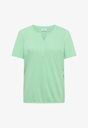 Vaaleanvihreä naisten lyhythihainen paita pyöreällä pääntielle ja etuslitsillä, joustava helma, pehmeästä, teksturoidusta kankaasta.