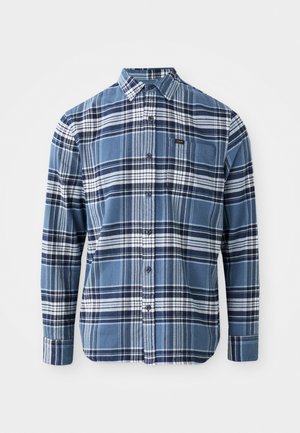 Kék és fehér kockás hosszú ujjú pamut ing; gombos gallérral; kis logófolt található a mellzsebén.