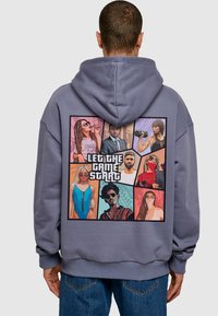Gray hoodie featuring a multicolored graphic collage on the back with various cartooned figures and the text "LET THE GAME START."