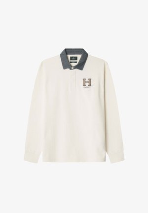 Langärmliges Polohemd in Creme mit einem dunkelgrauen Kragen. Verfügt über ein gesticktes 'H' und 'HACKETT'-Logo auf der linken Brust. Aus weichem Baumwollmaterial.