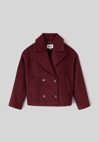 Veste double boutonnage en laine bordeaux avec larges revers, deux poches avant et boutons ronds, possédant une finition douce et texturée.