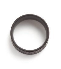 Black silicone ring with a smooth interior and textured exterior featuring a pattern of raised dots. Ring has a rounded, classic shape.